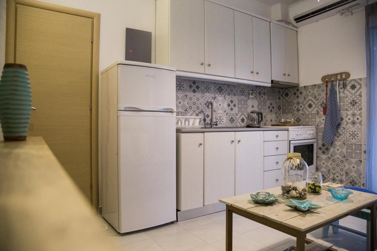 Grey Theros Apartments Paralia Dionysiou Exteriör bild